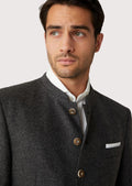 Elegant men's Bavarian jacket with premium wool fabric and rustic button detailing, perfect for festive occasions.

