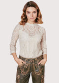 Rustic Bavarian women's suede lederhosen with detailed floral motifs, decorative front flap, and classic Oktoberfest appeal.