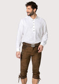 Rustic brown goatskin suede kniebund lederhosen featuring a traditional belt, knee ties, and authentic Bavarian styling