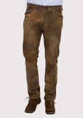 Rustic brown leather Trachten pants for men featuring a slim fit design, premium suede texture, and Bavarian heritage styling