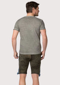 Distressed suede lederhosen featuring Bavarian crest embroidery, lion artwork and heritage styling