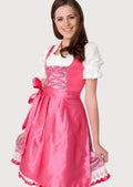 Women's pink satin Dirndl dress with lace-up bodice, white puff sleeve blouse, glossy pink apron, traditional Bavarian Oktoberfest outfit, authentic German Trachten clothing.