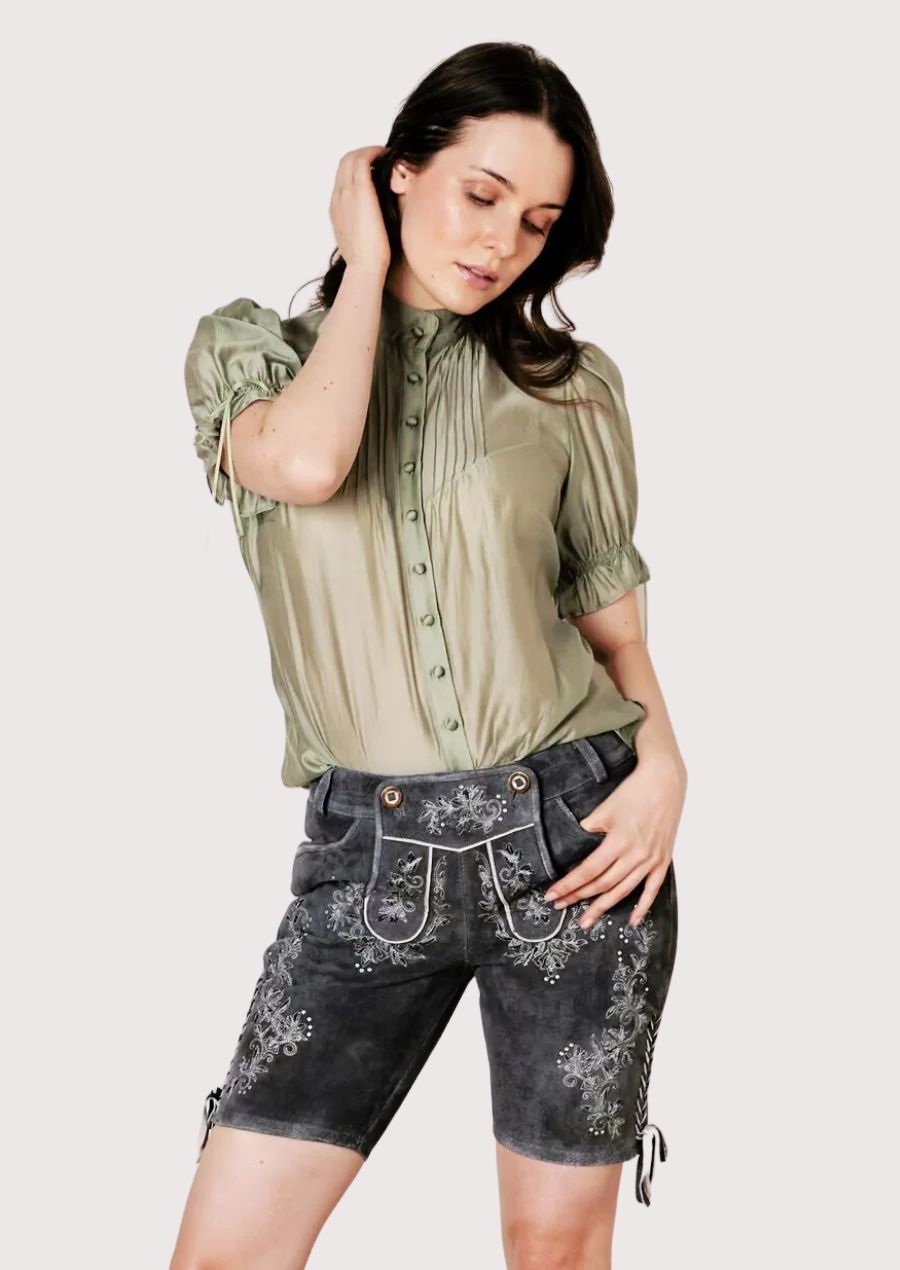 Women's Alpine lederhosen featuring silver embroidery, premium gray suede, and traditional German styling.