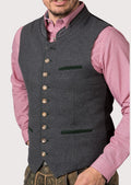 Elegant men’s Bavarian vest with embroidered detailing, wooden buttons, and modern fit, perfect for cultural festivals and weddings.