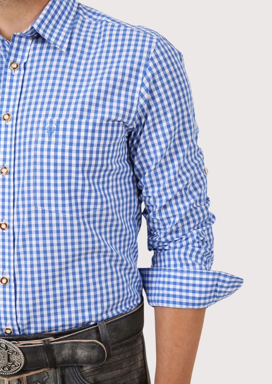 Stylish men’s blue checked shirt with rolled sleeves