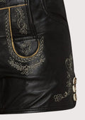 High-quality leather lederhosen for women with delicate embroidery and a flattering adjustable fit, perfect for Oktoberfest, weddings, and traditional festivals.