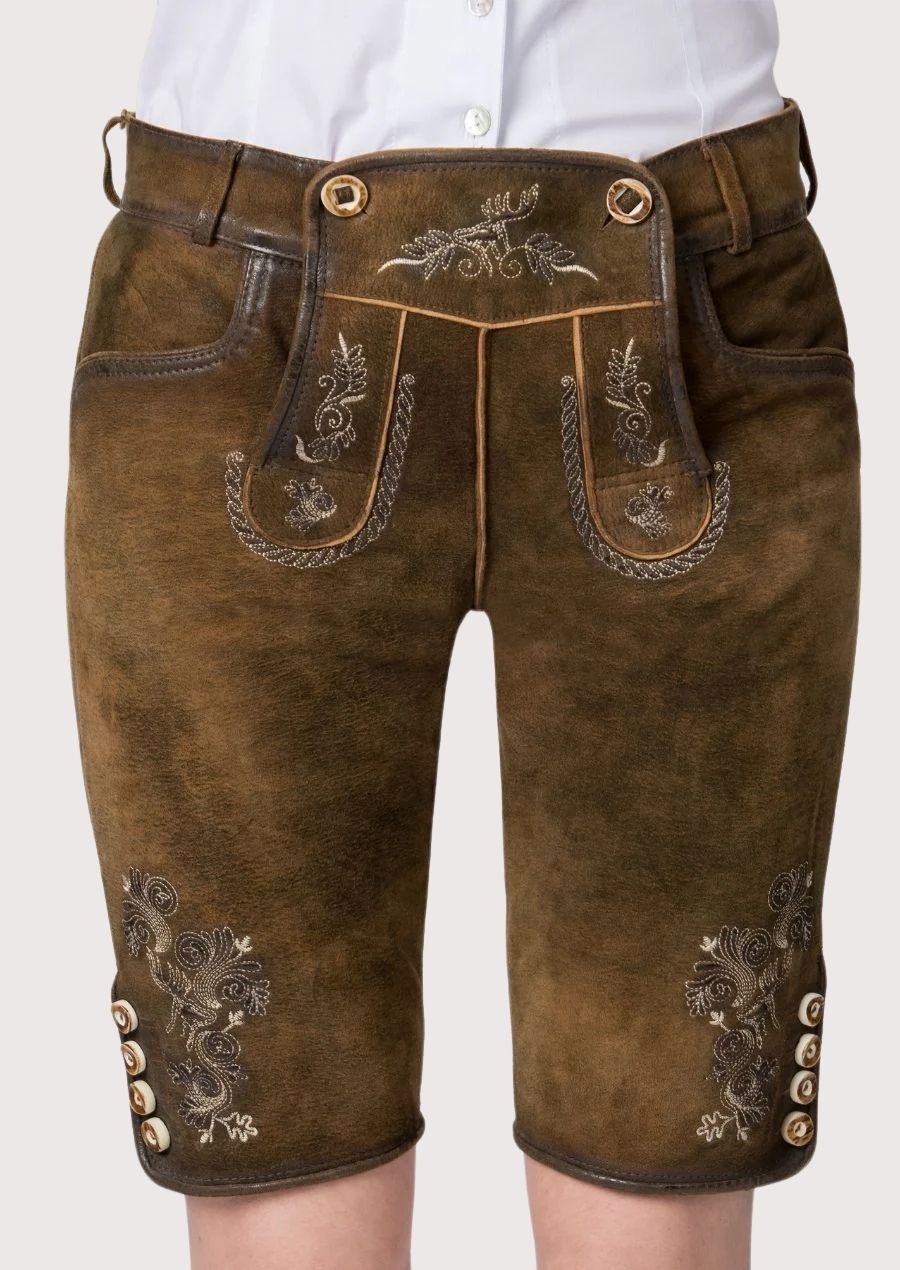 Women's folk style knee-length lederhosen with decorative embroidery, side button detailing, and traditional craftsmanship.