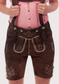Authentic Bavarian women's leather shorts in dark brown suede with embroidered accents, suspenders, and Alpine styling.