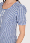Festive women’s Dirndl blouse, blue gingham pattern with feminine lace trim, ideal for Oktoberfest and cultural events.