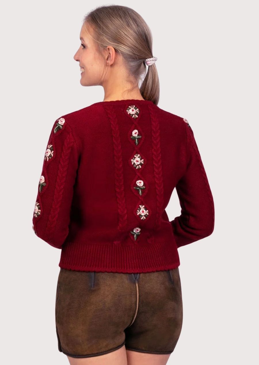 Traditional Alpine leather shorts for women with decorative embroidery, heritage-inspired design, and Bavarian character.