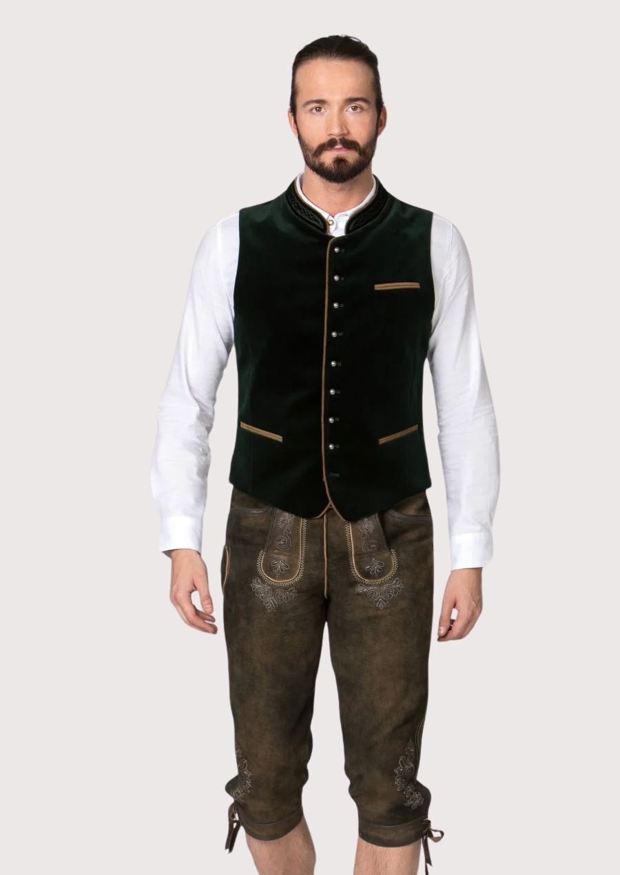 Traditional alpine waistcoat in deep green velvet fabric