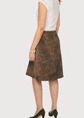Traditional alpine women’s brown leather skirt styling