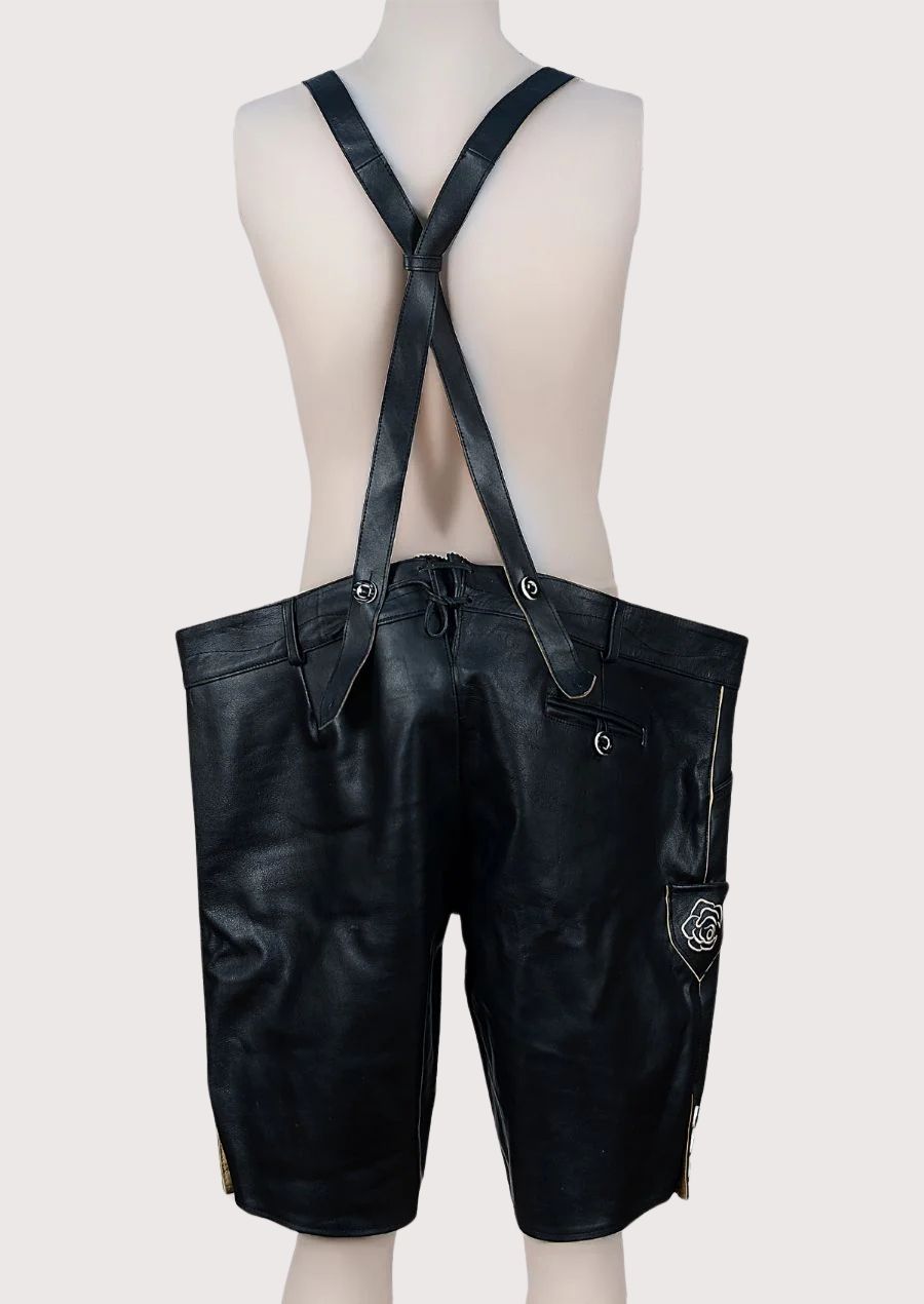 Black suede lederhosen with decorative suspenders, contrast embroidery, and classic Oktoberfest appeal