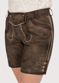 Traditional Bavarian lederhosen shorts for women crafted from distressed suede with Alpine-inspired embroidery.