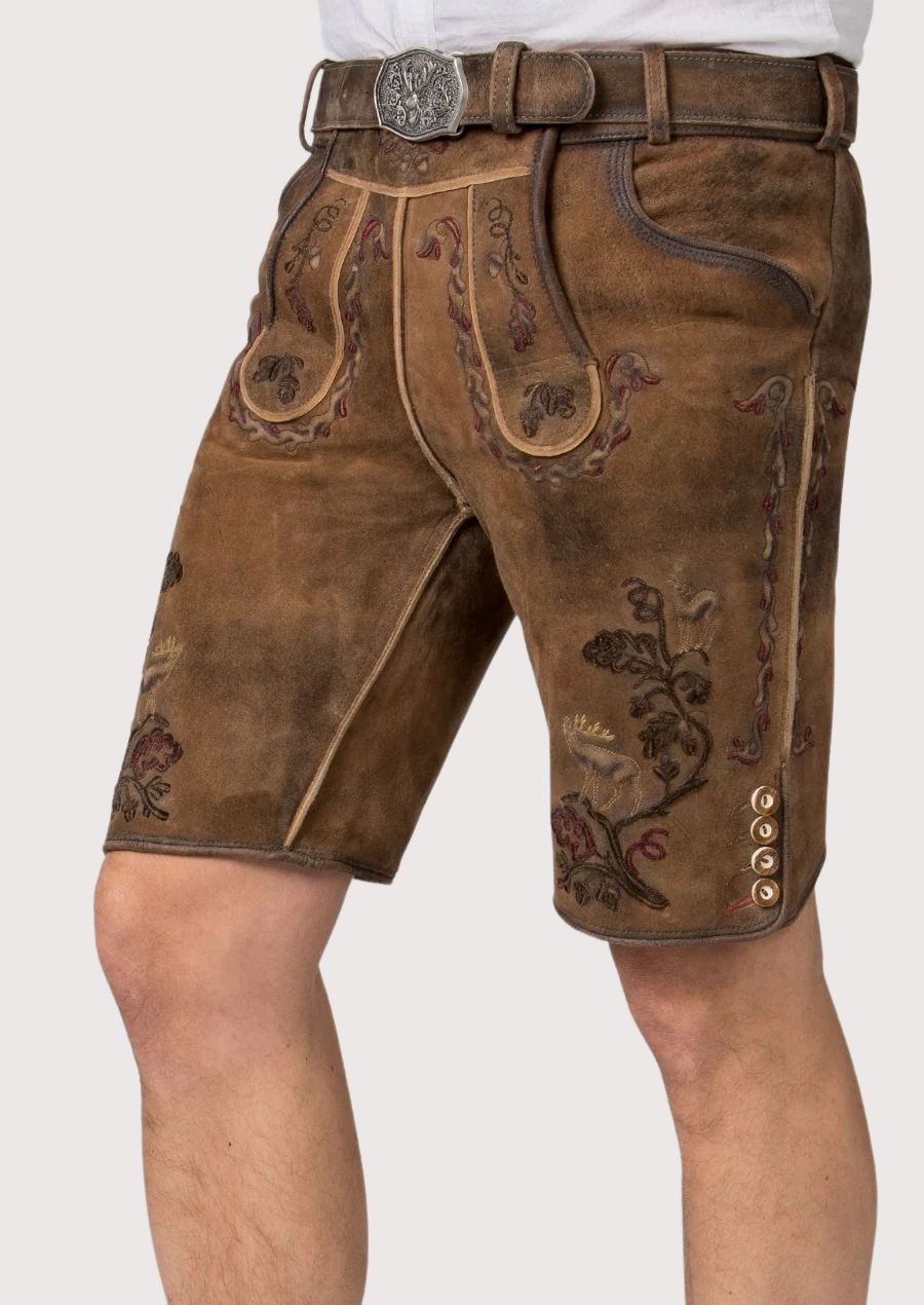 Authentic brown lederhosen shorts with embroidered stag artwork and decorative burgundy accents