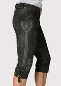Traditional black Bavarian Bundhosen with rustic finish, decorative side embroidery, and authentic Alpine craftsmanship