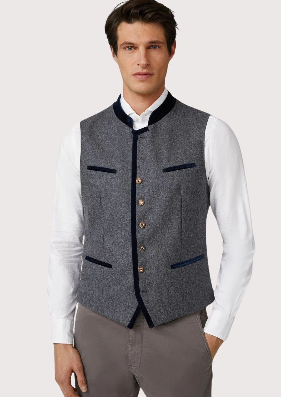 Grey Bavarian waistcoat featuring navy trim and buttons