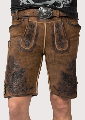 Men's bold leather lederhosen featuring detailed floral and animal motifs, perfect for cultural events and celebrations.