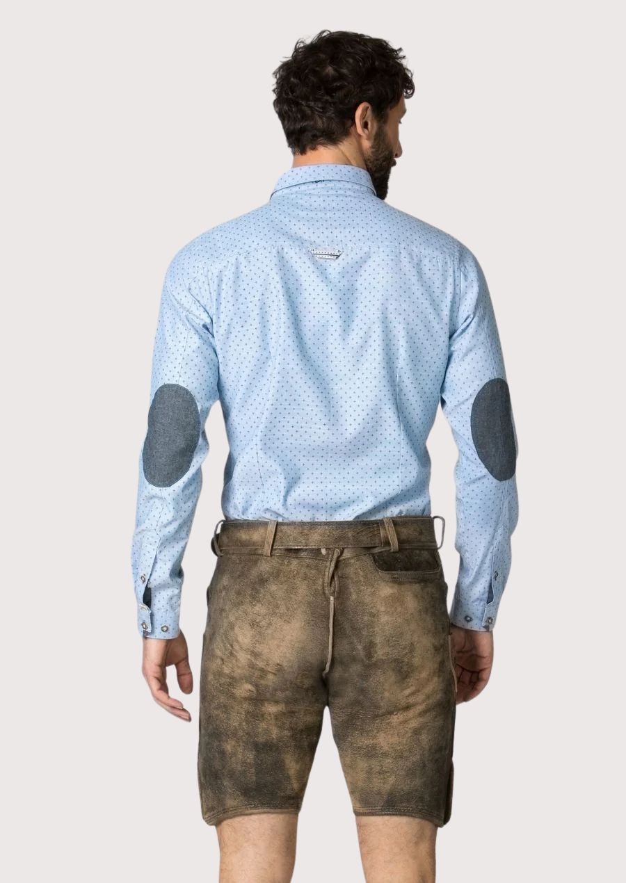 Premium brown suede lederhosen showcasing decorative embroidery and authentic Alpine styling
