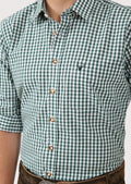 Authentic green plaid Oktoberfest shirt styled with lederhosen for men

