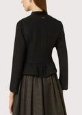 Traditional black women’s trachten jacket with curved hem and heritage alpine craftsmanship.