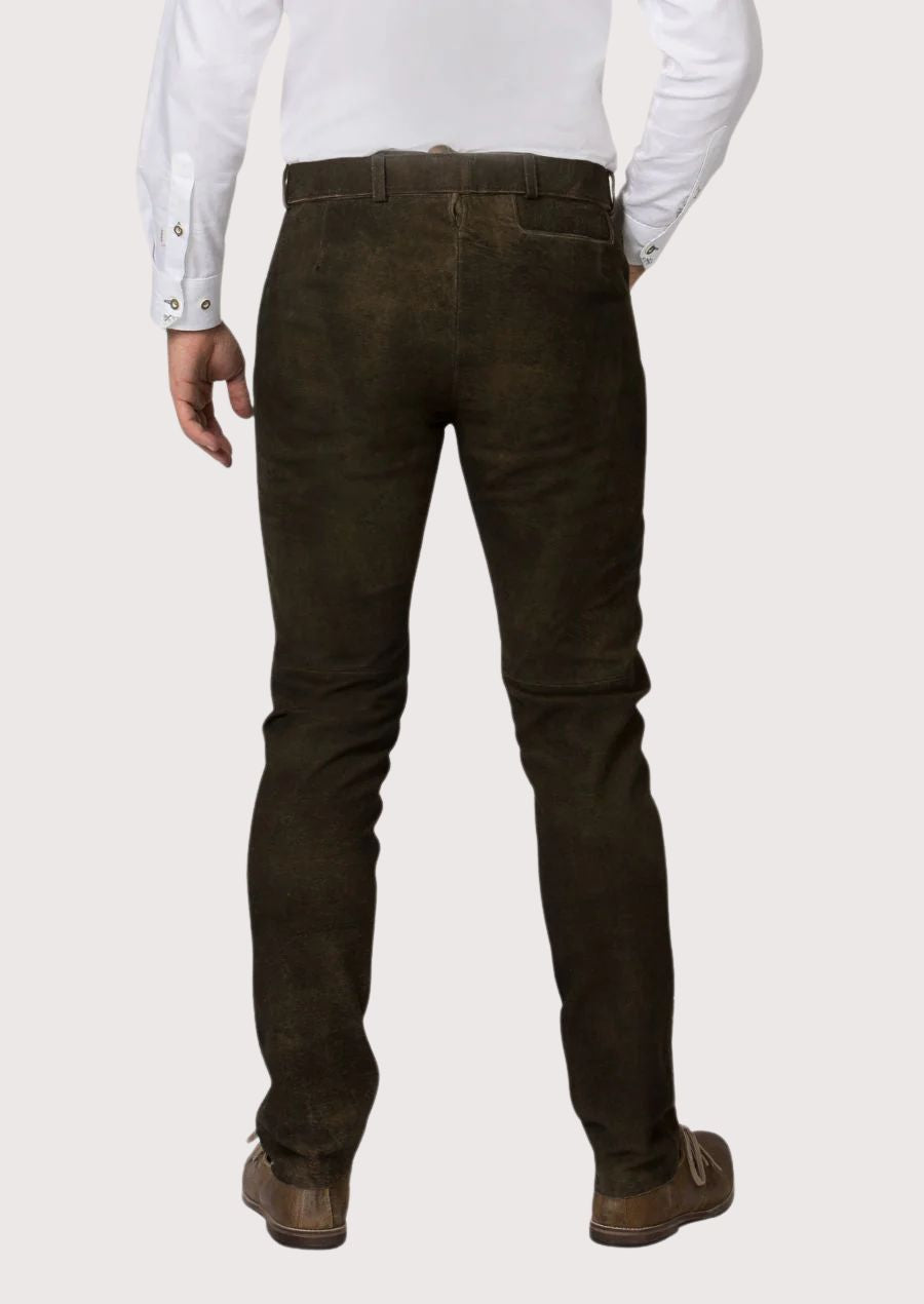 Vintage black Bavarian pants with belt detail, slim silhouette, and traditional Alpine fashion appeal