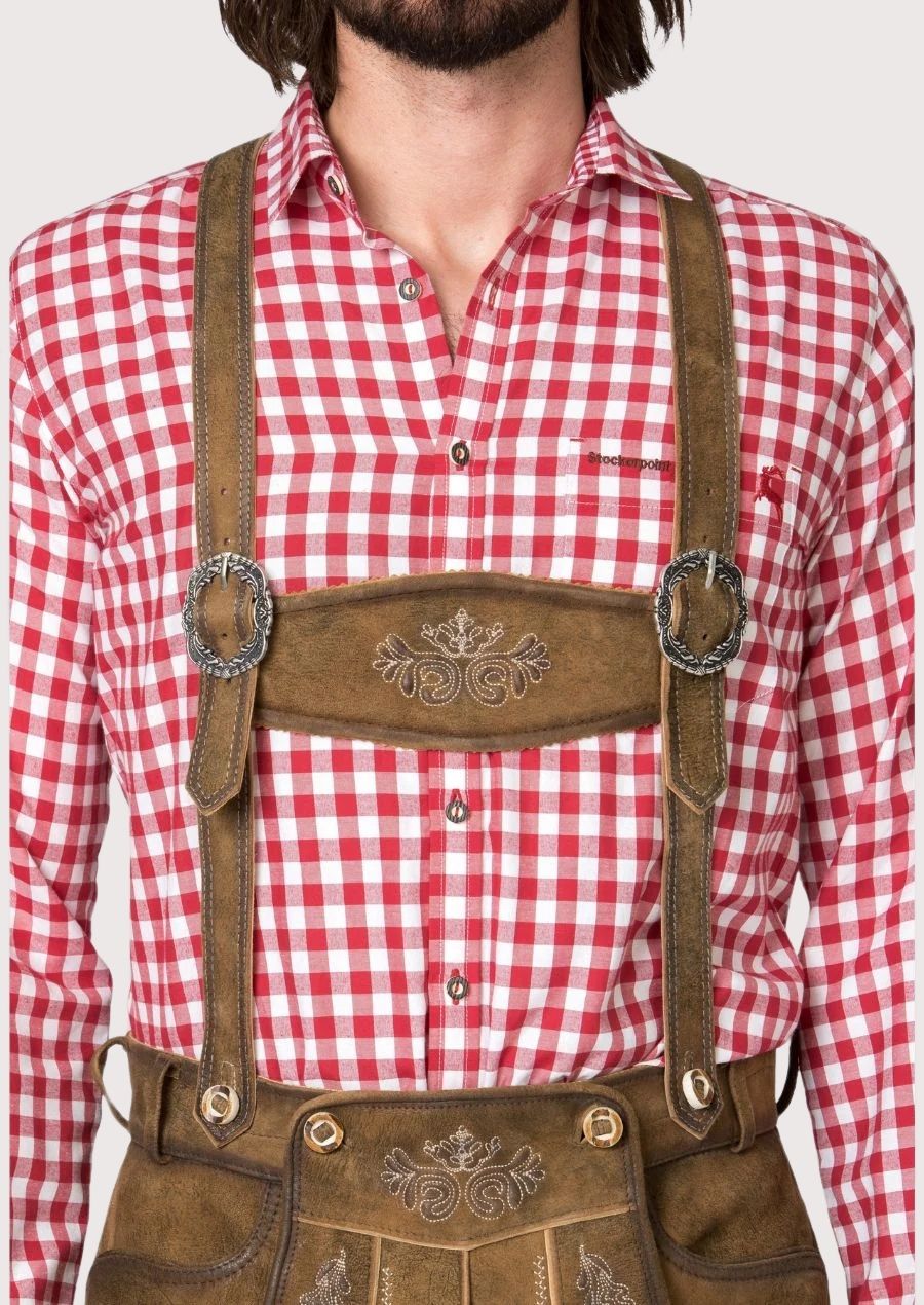 Vintage brown Bundhosen with classic braces, knee-length fit, and ornate Bavarian embroidery