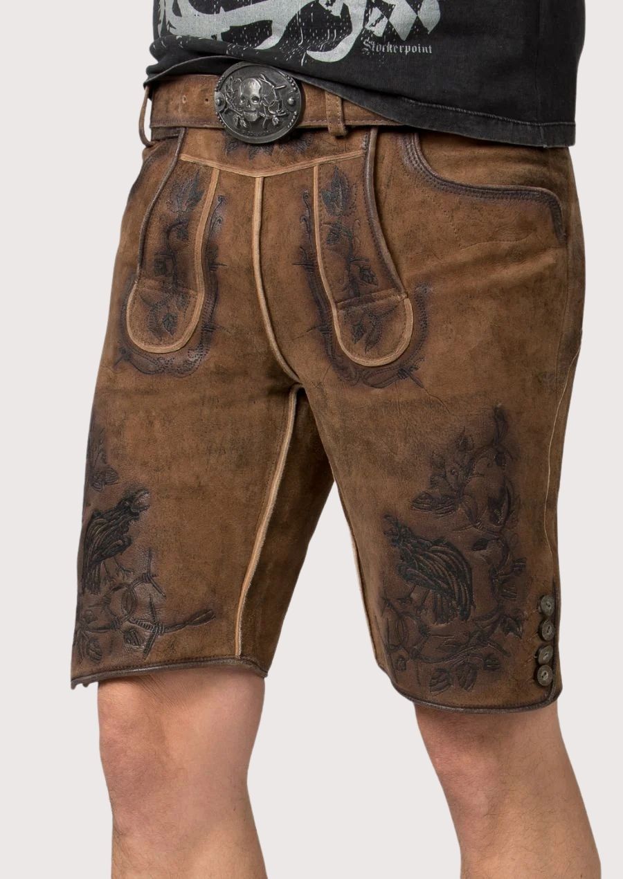 Traditional brown goatskin suede lederhosen styled with a black graphic tee for a modern Bavarian outfit