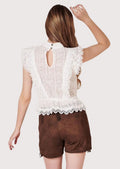 Vintage inspired Bavarian lederhosen style with floral embroidery, premium suede leather, and feminine Alpine charm.