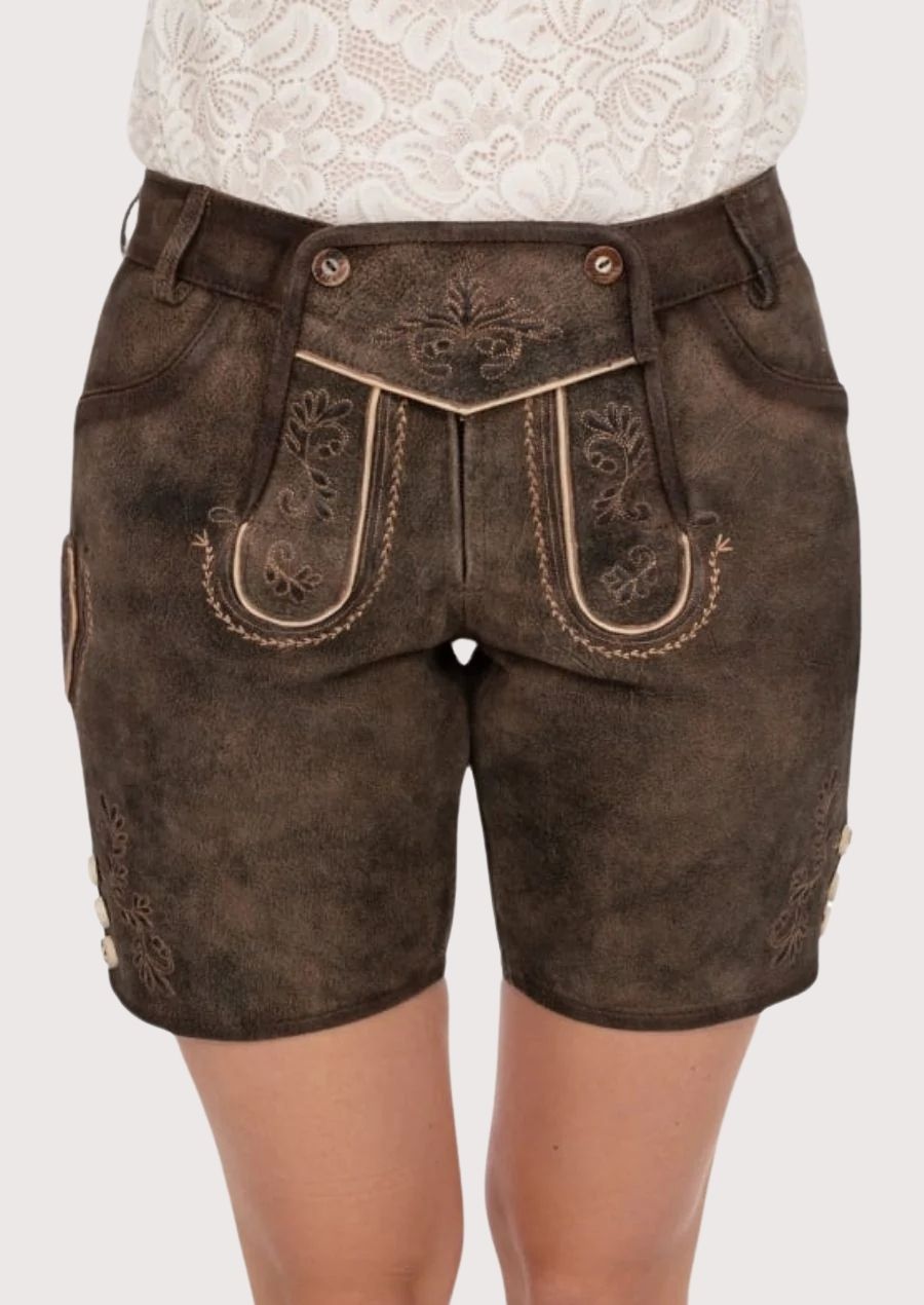 Premium German lederhosen leather shorts featuring aged suede finish, Alpine embroidery, and traditional tailoring.