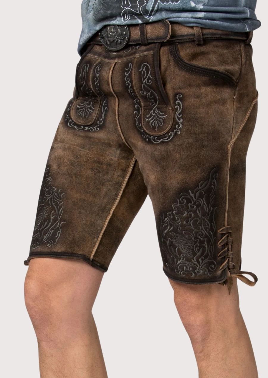 Distressed brown lederhosen shorts with decorative black embroidery and authentic Oktoberfest appeal