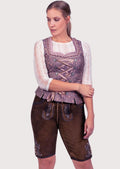 Women's brown embroidered lederhosen paired with a lace blouse and traditional Alpine lace-up bodice for authentic Bavarian style.