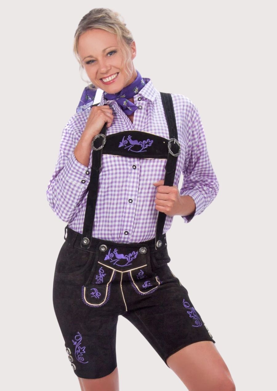 Women's Alpine lederhosen style with embroidered suspenders, decorative purple motifs, and heritage-inspired design.