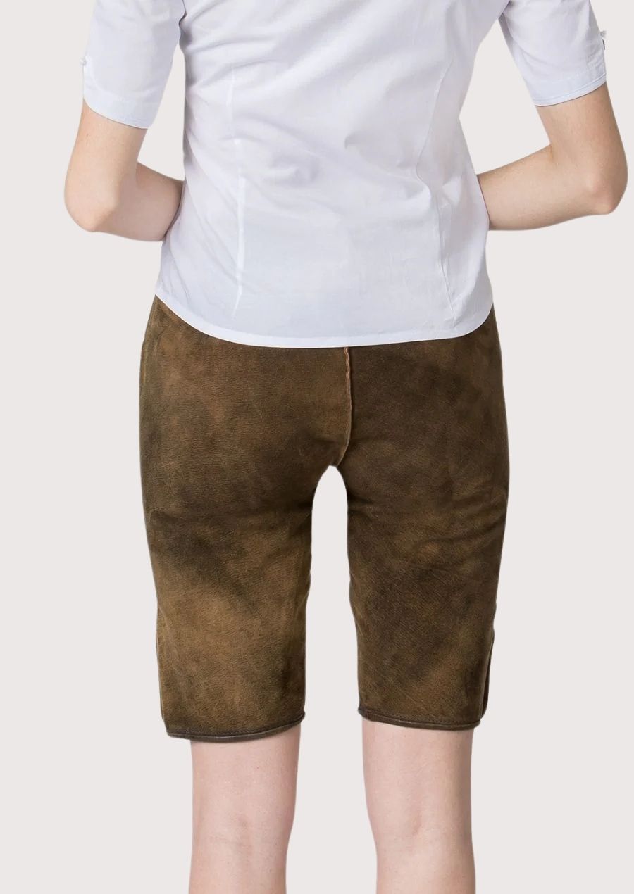 Women's Bavarian leather shorts showcasing embroidered floral motifs, horn-style buttons, and Alpine craftsmanship.