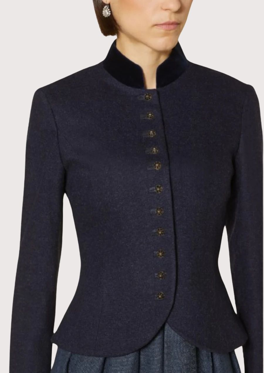 Navy blue women’s Bavarian jacket featuring tailored fit and traditional German styling.