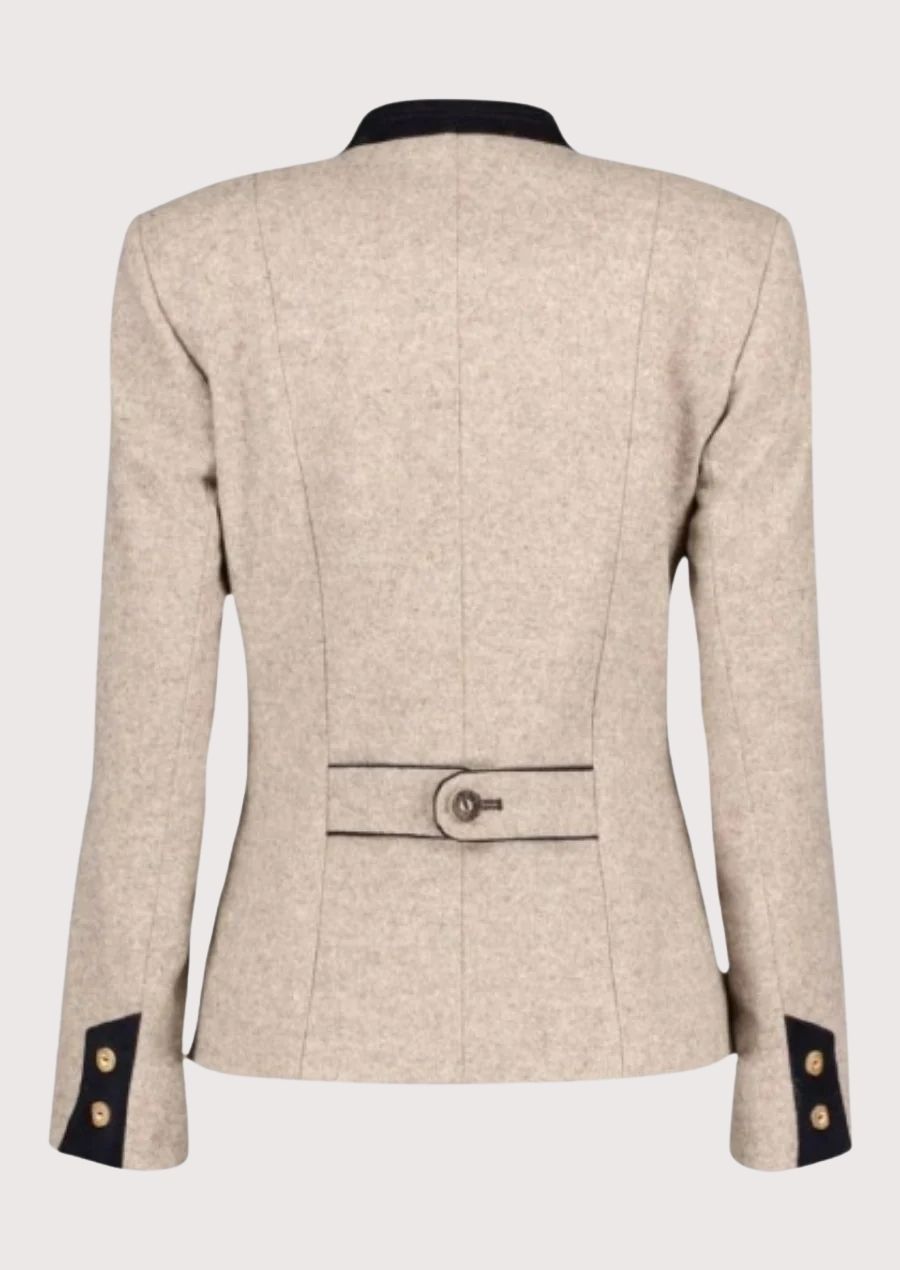 Women’s beige traditional alpine jacket made from structured wool fabric.