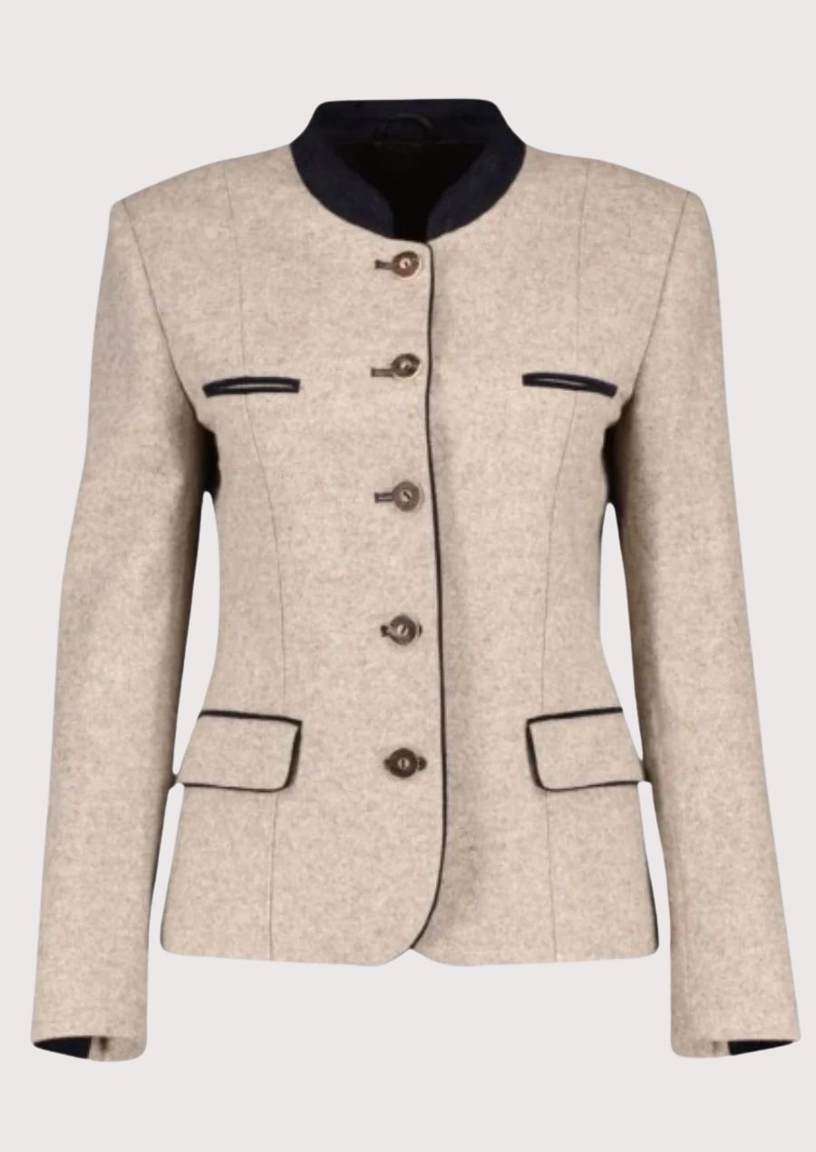 Women's beige wool Trachten jacket with navy trim, stand-up collar, decorative horn-style buttons, tailored Bavarian jacket, authentic German Alpine fashion.