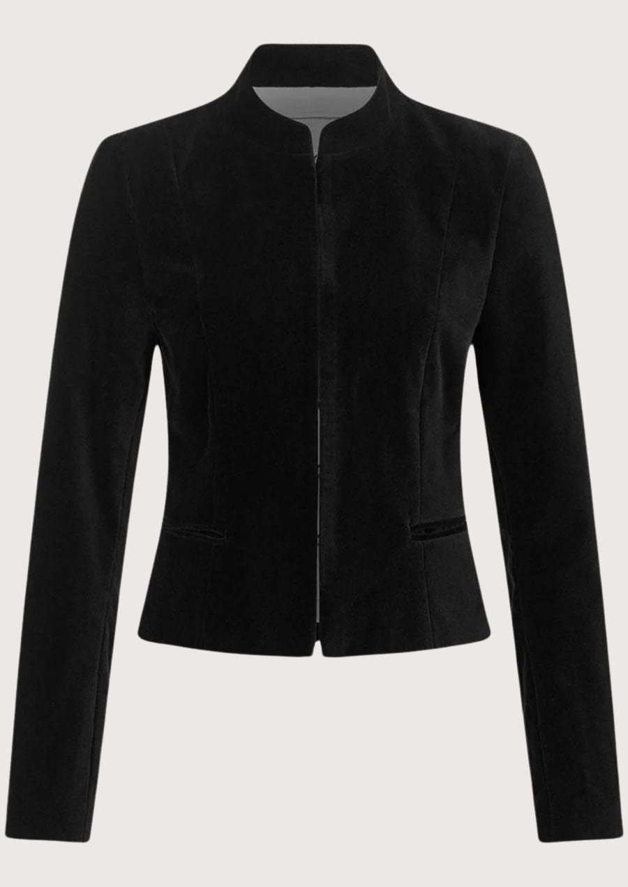 Women's black velvet Trachten jacket with stand-up collar, tailored fitted silhouette, concealed front closure, traditional Bavarian Alpine velvet jacket, authentic German heritage fashion.