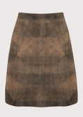 Women wearing brown trachten leather skirt alpine design
