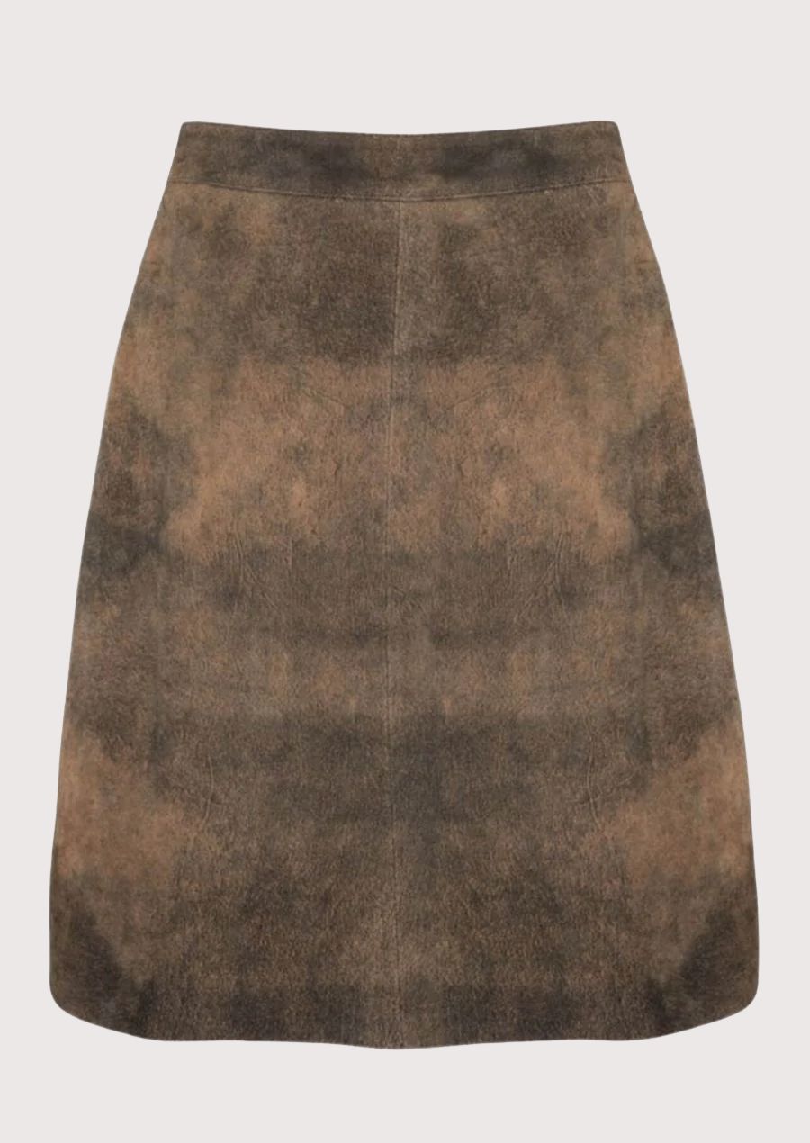 Women wearing brown trachten leather skirt alpine design