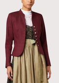 Front view of a women's burgundy Trachten jacket with premium wool, silver buttons, fitted silhouette, and Alpine craftsmanship.
