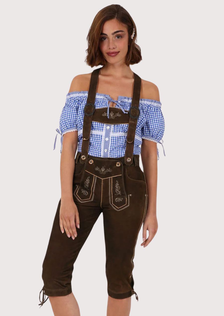 Women's dark brown suede lederhosen with suspenders, knee-length fit, decorative embroidery, and side lace ties.