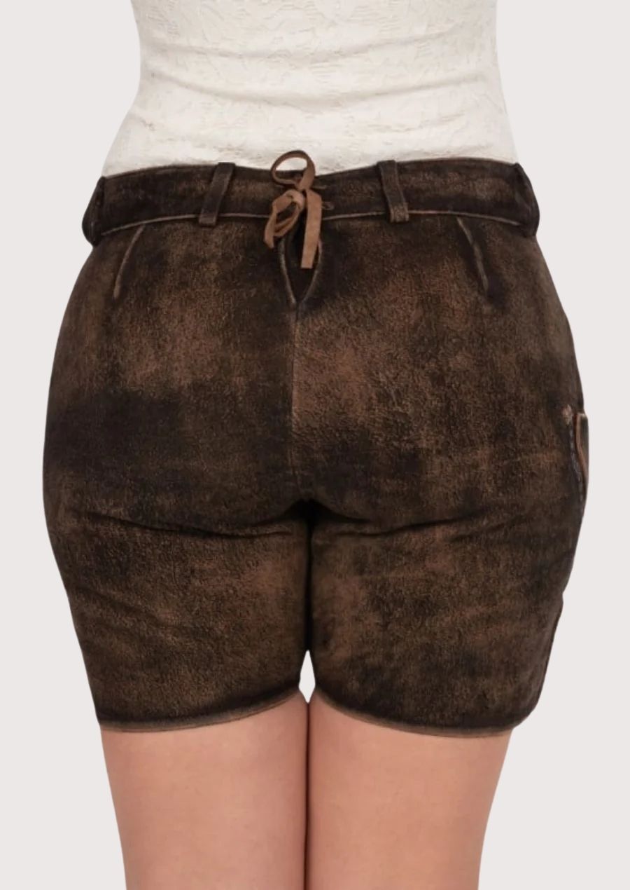 Women's distressed Bavarian leather shorts crafted from premium suede with decorative embroidery and folk-inspired accents.