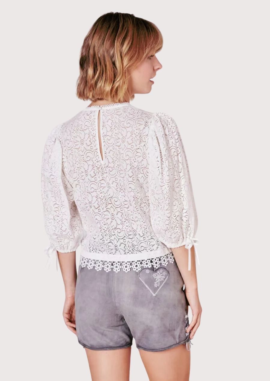 Women's embroidered gray Trachten shorts featuring decorative stitching, folk-inspired artistry, and Alpine elegance.