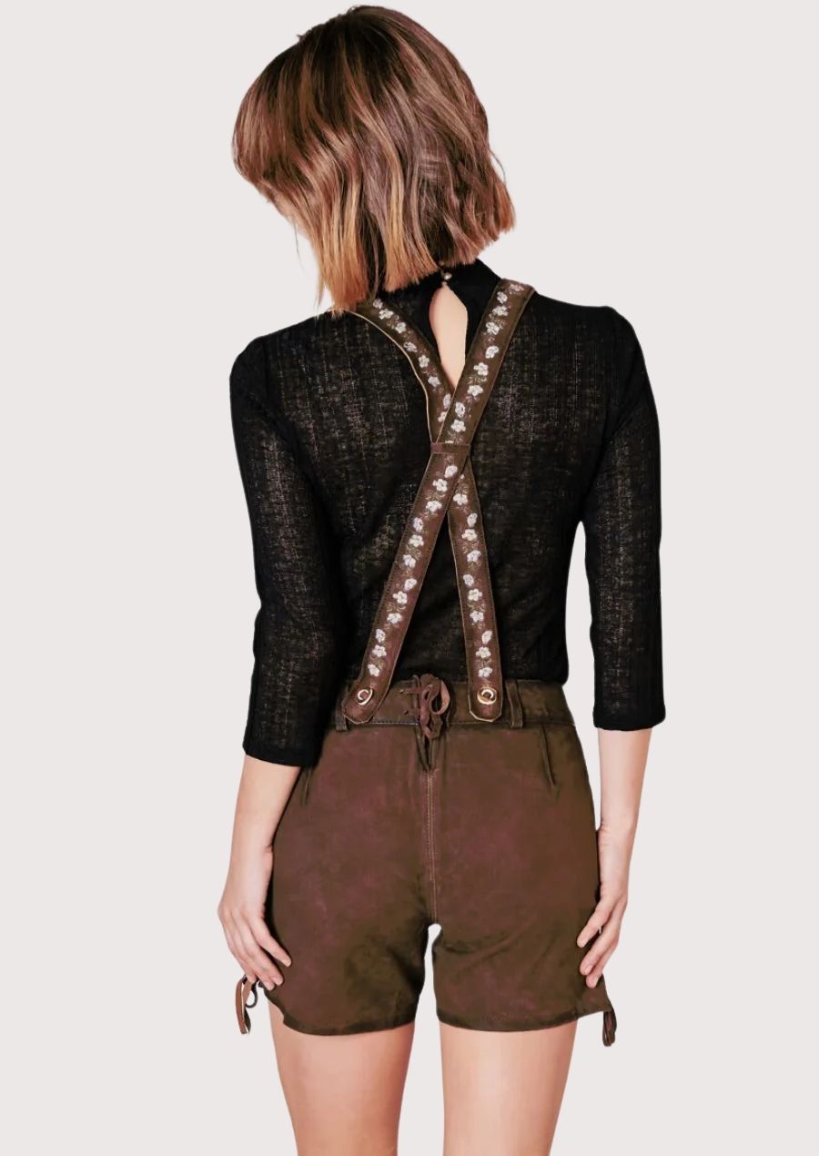 Women’s traditional lederhosen shorts featuring floral embroidery and decorative suspenders