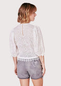 Versatile women's lederhosen featuring traditional craftsmanship and modern style for a chic festival look.