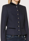 Navy blue women’s trachten jacket with stand collar, fitted silhouette, and traditional Bavarian buttons.