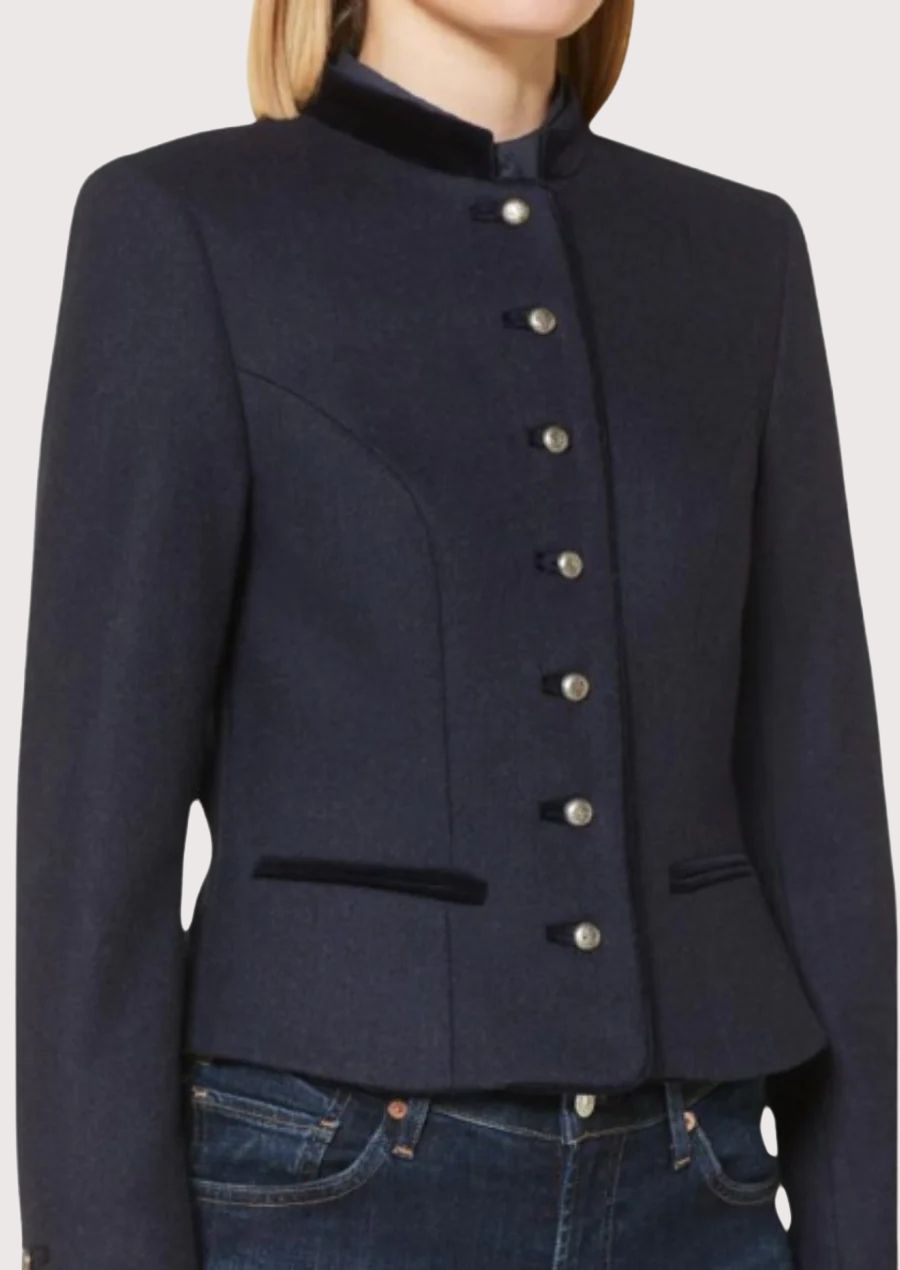 Navy blue women’s trachten jacket with stand collar, fitted silhouette, and traditional Bavarian buttons.