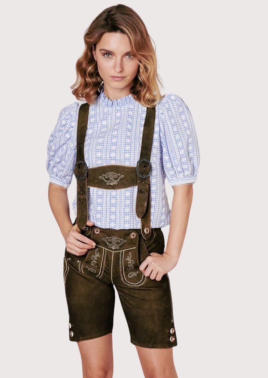 Classic women’s Oktoberfest lederhosen featuring brown leather shorts and heritage suspenders