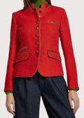Women's red Trachten wool jacket featuring a stand collar, antique buttons, olive trim, and authentic Bavarian tailoring.